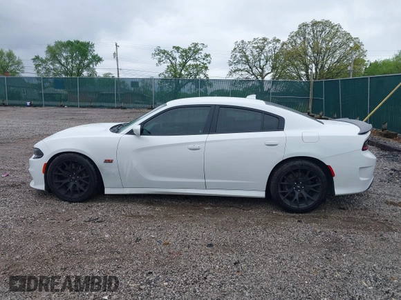 2019 Dodge Charger Scat Pack with VIN 2C3CDXGJ9KH691136, listed as a IAAI auction lot 42056137 with 78,814 mi miles and . Bid and sale history available at DreamBid. Image 14.