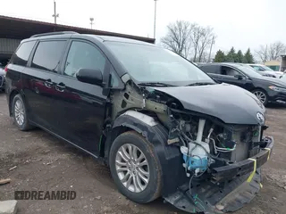 2011 Toyota Sienna XLE AAS with VIN 5TDYK3DC9BS071636, listed as a IAAI auction lot 41972332 with 204,477 mi miles and . Bid and sale history available at DreamBid. Image 1.