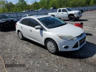 2013 Ford Focus SE z VIN 1FADP3F24DL128940, wystawiony jako Copart lot #54798665 z przebiegiem Nie podano mil oraz Tytuł czysty. Historia ofert i sprzedaży dostępna na DreamBid. Obrazek 4.