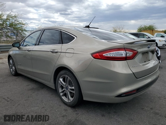 2015 Ford Fusion Titanium Hybrid with VIN 3FA6P0RUXFR115229, listed as a Copart auction lot 54629355 with 76,671 mi miles and Salvage title. Bid and sale history available at DreamBid. Image 2.