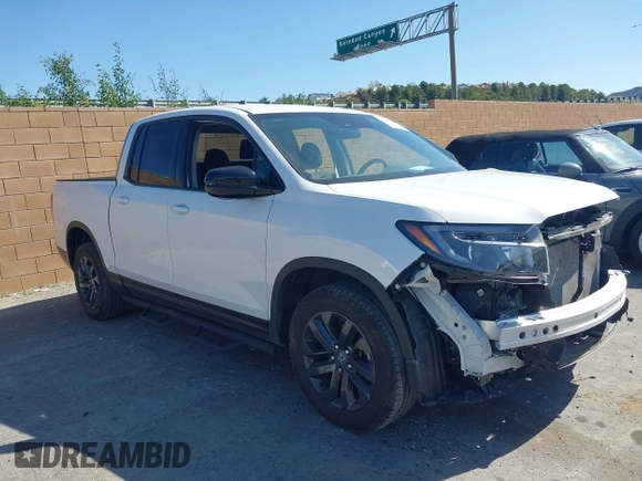 2023 Honda Ridgeline Sport z VIN 5FPYK3F13PB060341, wystawiony jako IAAI lot #41955592 z przebiegiem 27 927 mil mil oraz . Historia ofert i sprzedaży dostępna na DreamBid. Obrazek 1.