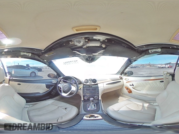 2009 Mercedes-Benz CLK 550 with VIN WDBTJ72H69F266105, listed as a Copart auction lot 79723224 with 114,840 mi miles and Salvage Title. Bid and sale history available at DreamBid. Image 12.