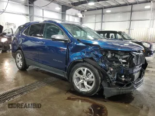2020 Chevrolet Equinox Premier z VIN 2GNAXXEV0L6273682, wystawiony jako Copart lot #55155065 z przebiegiem 71 754 mil mil oraz Szkoda całkowita • Salvage title. Historia ofert i sprzedaży dostępna na DreamBid. Obrazek 4.