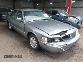 2005 Mercury Grand Marquis LS Premium z VIN 2MEHM75W75X629937, wystawiony jako IAAI lot #42099124 z przebiegiem 96 493 mil mil oraz . Historia ofert i sprzedaży dostępna na DreamBid. Obrazek 1.