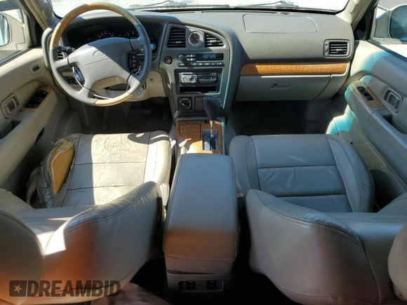 2001 Infiniti QX4 Luxury z VIN JNRDR07Y51W109670, wystawiony jako Copart lot #45500625 z przebiegiem 142 473 mil mil oraz Szkody całkowita. Historia ofert i sprzedaży dostępna na DreamBid. Obrazek 8.