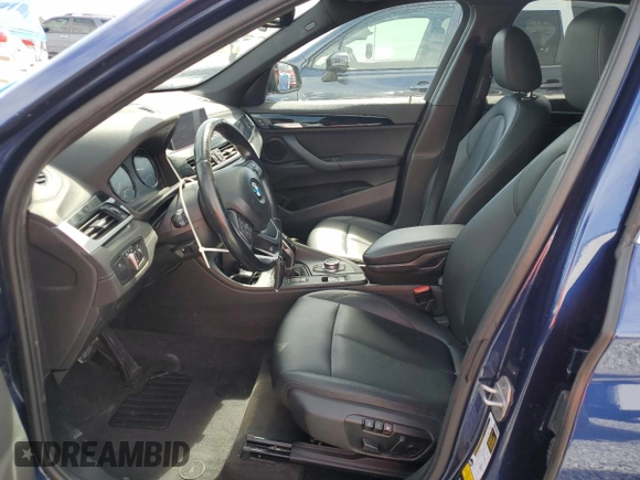 2020 BMW X1 xDrive28i with VIN WBXJG9C0XL5R33141, listed as a Copart auction lot 63040155 with 165,172 mi miles and Clean title. Bid and sale history available at DreamBid. Image 7.