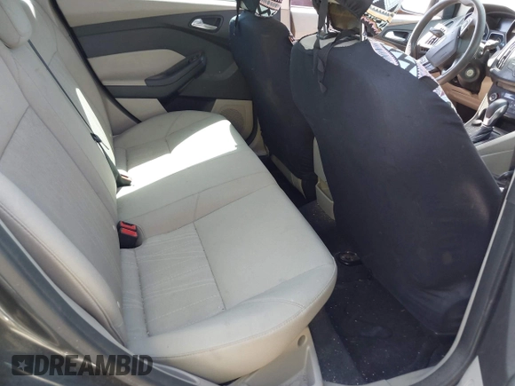 2018 Ford Focus SE with VIN 1FADP3FE6JL270910, listed as a IAAI auction lot 42130371 with 121,240 mi miles. Bid and sale history available at carsss.com. Image 8.