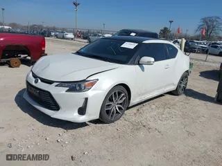 2016 Scion tC with VIN JTKJF5C70GJ019590, listed as a IAAI auction lot 41798426 with 69,045 mi miles. Bid and sale history available at carsss.com. Image 22.