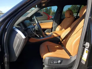 2023 BMW X5 xDrive40i with VIN 5UXCR6C04P9P15644, listed as a Copart auction lot 60710885 with 49,077 mi miles and Salvage title. Bid and sale history available at DreamBid. Image 7.