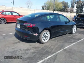 2022 Tesla Model 3 Long Range with VIN 5YJ3E1EB1NF133356, listed as a IAAI auction lot 41568303 with 73,406 mi miles and . Bid and sale history available at DreamBid. Image 4.