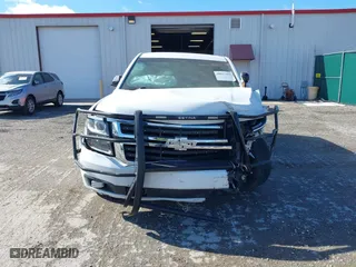 2020 Chevrolet Tahoe Commercial with VIN 1GNSKDEC2LR217697, listed as a IAAI auction lot 40815499 with 128,503 mi miles. Bid and sale history available at carsss.com. Image 12.