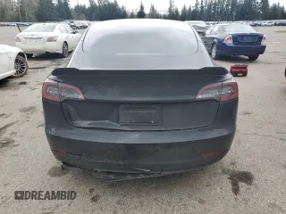 2023 Tesla Model 3 with VIN 5YJ3E1EA3PF644898, listed as a Copart auction lot 50427685 with 36,488 mi miles and Salvage Title. Bid and sale history available at DreamBid. Image 6.