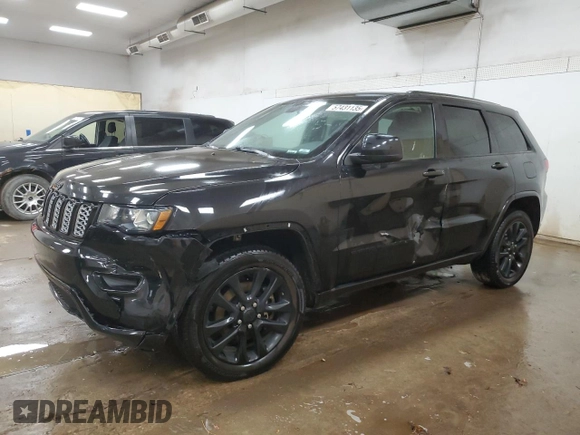 2021 Jeep Grand Cherokee Laredo X with VIN 1C4RJFAG0MC535661, listed as a Copart auction lot 57431135 with 101,314 mi miles and Salvage title. Bid and sale history available at DreamBid. Image 1.