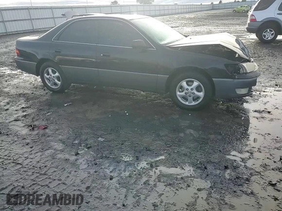 1997 Lexus ES 300 Luxury Sport Sdn with VIN JT8BF22G5V0057703, listed as a Copart auction lot 84712734 with 160,575 mi miles and Salvage Title. Bid and sale history available at carsss.com. Image 11.