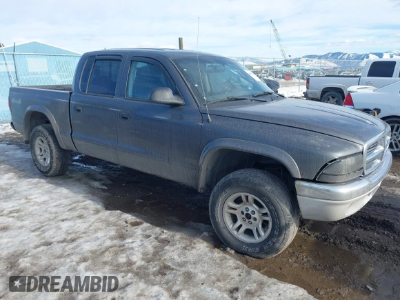 2004 Dodge Dakota SLT with VIN 1D7HG48N44S701906, listed as a IAAI auction lot 41662483 with 202,575 mi miles and . Bid and sale history available at carsss.com. Image 1.