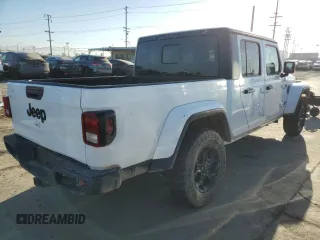 2023 Jeep Gladiator Sport S with VIN 1C6HJTAG4PL528847, listed as a Copart auction lot 64470375 with 36,177 mi miles and Salvage title. Bid and sale history available at DreamBid. Image 3.