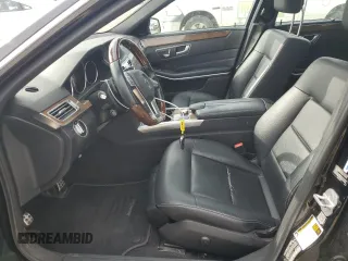 2015 Mercedes-Benz E 350 Luxury with VIN WDDHH8JB0FB083412, listed as a Copart auction lot 52053855 with 117,040 mi miles and Salvage title. Bid and sale history available at DreamBid. Image 7.
