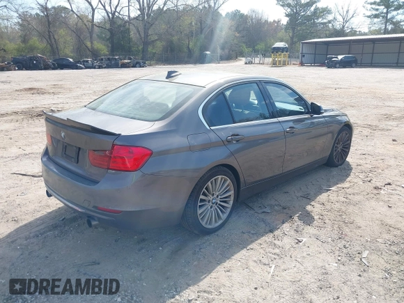 2013 BMW 3 Series 335i with VIN WBA3A9C51DF476537, listed as a IAAI auction lot 41900742 with 184,094 mi miles and . Bid and sale history available at DreamBid. Image 4.