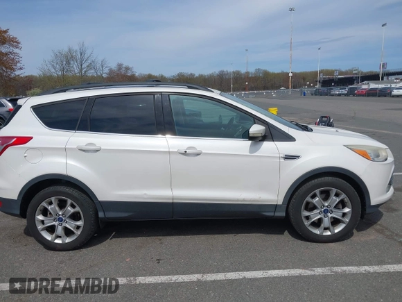 2013 Ford Escape SEL with VIN 1FMCU9HXXDUD82944, listed as a IAAI auction lot 42079667 with 97,304 mi miles. Bid and sale history available at carsss.com. Image 12.