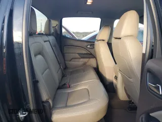 2015 GMC Canyon 4WD SLT z VIN 1GTG6CE34F1121540, wystawiony jako Copart lot #86190774 z przebiegiem 141 381 mil mil oraz Czysty tytuł • Clean title. Historia ofert i sprzedaży dostępna na DreamBid. Obrazek 10.