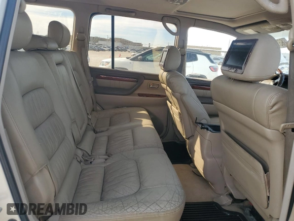 2002 Lexus LX 470 z VIN JTJHT00W623514108, wystawiony jako Copart lot #88704265 z przebiegiem Nie podano mil oraz Tytuł czysty. Historia ofert i sprzedaży dostępna na DreamBid. Obrazek 11.