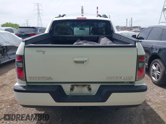 2012 Honda Ridgeline RTL with VIN 5FPYK1F57CB453096, listed as a IAAI auction lot 42206169 with 82,846 mi miles and . Bid and sale history available at DreamBid. Image 16.