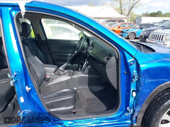 2013 Mazda CX-5 Grand Touring with VIN JM3KE4DE4D0123837, listed as a IAAI auction lot 42031074 with 121,818 mi miles. Bid and sale history available at carsss.com. Image 5.