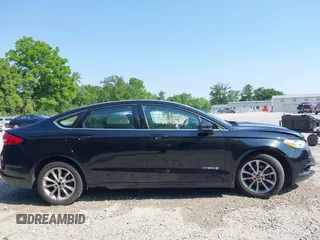 2017 Ford Fusion Hybrid SE with VIN 3FA6P0LU5HR344879, listed as a IAAI auction lot 42483771 with 146,603 mi miles and . Bid and sale history available at DreamBid. Image 14.
