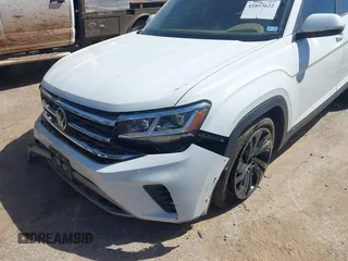 2022 Volkswagen Atlas SE z VIN 1V2JR2CA9NC542633, wystawiony jako IAAI lot #41853622 z przebiegiem 78 261 mil mil oraz . Historia ofert i sprzedaży dostępna na DreamBid. Obrazek 6.
