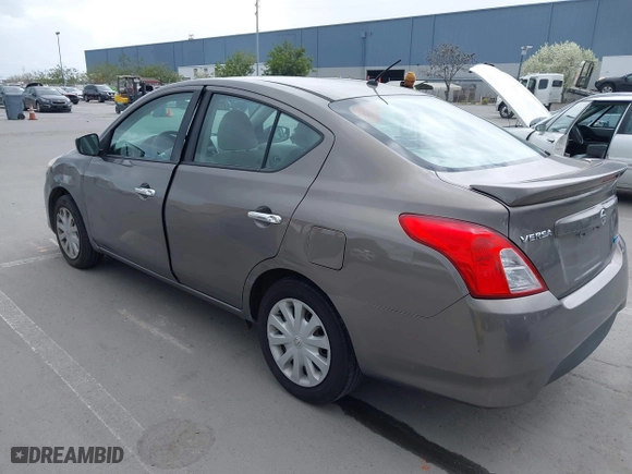 2015 Nissan Versa SV with VIN 3N1CN7AP7FL811747, listed as a IAAI auction lot 41911815 with 246,165 mi miles. Bid and sale history available at carsss.com. Image 3.
