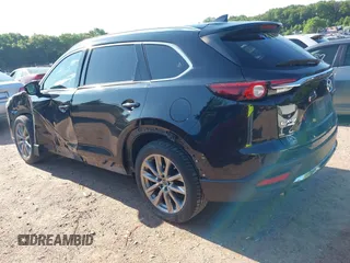 2018 Mazda CX-9 Grand Touring with VIN JM3TCBDYXJ0208962, listed as a IAAI auction lot 42629720 with 123,929 mi miles and . Bid and sale history available at DreamBid. Image 3.