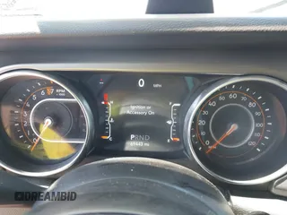 2021 Jeep Gladiator Willys z VIN 1C6HJTAG6ML507039, wystawiony jako IAAI lot #42057637 z przebiegiem 69 443 mil mil oraz . Historia ofert i sprzedaży dostępna na DreamBid. Obrazek 7.