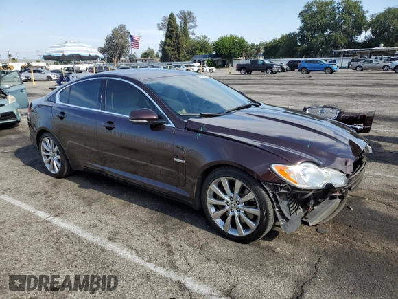 2011 Jaguar XF Premium with VIN SAJWA0GB1BLS08325, listed as a Copart auction lot 61190335 with 61,656 mi miles and Salvage title. Bid and sale history available at DreamBid. Image 4.