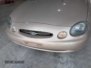 1999 Ford Taurus SE Comfort z VIN 1FAFP53S0XG145837, wystawiony jako IAAI lot #42384370 z przebiegiem 94 870 mil mil oraz . Historia ofert i sprzedaży dostępna na DreamBid. Obrazek 6.