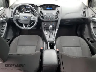 2016 Ford Focus SE z VIN 1FADP3F23GL405565, wystawiony jako Copart lot #60173935 z przebiegiem 82 167 mil mil oraz Szkoda całkowita • Salvage title. Historia ofert i sprzedaży dostępna na DreamBid. Obrazek 8.