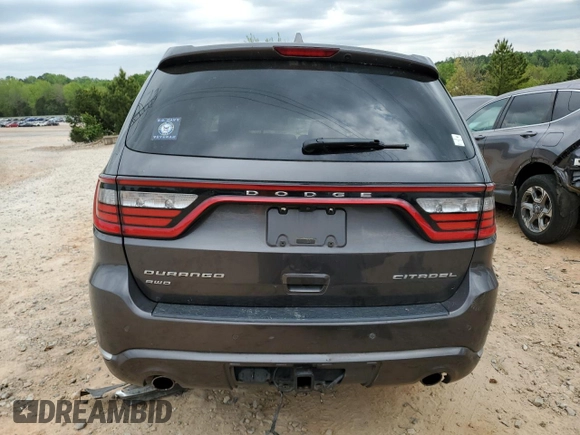 2017 Dodge Durango Citadel Anodized Platinum с VIN 1C4SDJET8HC753128, выставлен на аукционе Copart как лот 52612705 с пробегом 169 608 миль миль и Списание • Salvage title. История ставок и продаж доступна на DreamBid. Изображение 6.