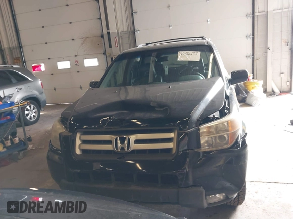 2007 Honda Pilot EX-L with VIN 2HKYF18647H504953, listed as a IAAI auction lot 41750435 with 186,097 mi miles and . Bid and sale history available at DreamBid. Image 12.