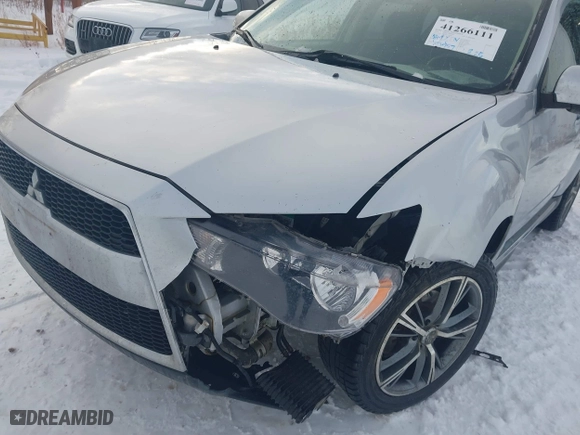 2013 Mitsubishi Outlander SE with VIN JA4JT3AW6DU020908, listed as a IAAI auction lot 41266111 with 193,967 mi miles. Bid and sale history available at carsss.com. Image 17.