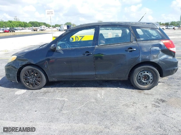 2003 Toyota Matrix Std with VIN 2T1KR32E63C116953, listed as a IAAI auction lot 41929877 with 299,999 mi miles. Bid and sale history available at carsss.com. Image 6.