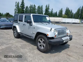 2012 Jeep Wrangler Unlimited Altitude with VIN 1C4HJWEG2CL140059, listed as a IAAI auction lot 42433563 with 189,868 mi miles and . Bid and sale history available at DreamBid. Image 1.