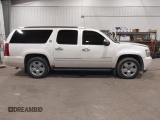 2010 Chevrolet Suburban LTZ with VIN 1GNUKKE31AR290571, listed as a IAAI auction lot 40948006 with 163,758 mi miles. Bid and sale history available at carsss.com. Image 12.