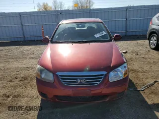 2009 Kia Spectra EX with VIN KNAFE221395656476, listed as a Copart auction lot 77700844 with 90,079 mi miles and Salvage Title. Bid and sale history available at carsss.com. Image 5.