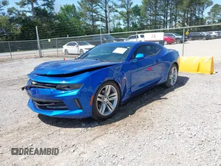 2018 Chevrolet Camaro 1LT z VIN 1G1FB1RS5J0101768, wystawiony jako IAAI lot #41990965 z przebiegiem 82 492 mil mil oraz . Historia ofert i sprzedaży dostępna na DreamBid. Obrazek 2.