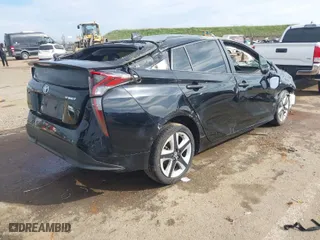2018 Toyota Prius Two with VIN JTDKARFU7J3062094, listed as a IAAI auction lot 41648271 with 116,260 mi miles. Bid and sale history available at carsss.com. Image 4.