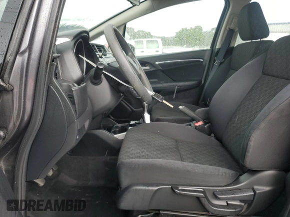 2015 Honda Fit LX с VIN 3HGGK5G59FM731945, выставлен на аукционе Copart как лот 61272285 с пробегом 126 060 миль миль и Списание • Salvage title. История ставок и продаж доступна на DreamBid. Изображение 7.