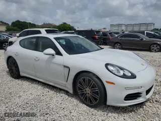 2016 Porsche Panamera 4 with VIN WP0AA2A75GL002991, listed as a Copart auction lot 69493904 with 39,554 mi miles and Salvage Title. Bid and sale history available at carsss.com. Image 4.