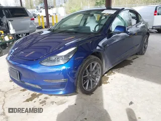 2022 Tesla Model 3 Long Range with VIN 5YJ3E1EB3NF267365, listed as a IAAI auction lot 41996594 with 32,687 mi miles and . Bid and sale history available at DreamBid. Image 18.