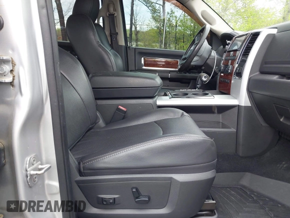 2010 Dodge 1500 SLT z VIN 1D7RB1CT5AS203992, wystawiony jako IAAI lot #41931671 z przebiegiem 122 831 mil mil oraz . Historia ofert i sprzedaży dostępna na DreamBid. Obrazek 5.
