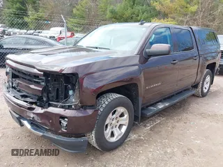 2016 Chevrolet Silverado 1500 LT with VIN 3GCUKREC3GG305792, listed as a IAAI auction lot 42083847 with 72,325 mi miles and . Bid and sale history available at DreamBid. Image 18.