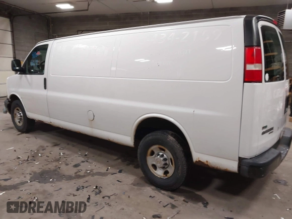 2012 Chevrolet Express Cargo Van with VIN 1GCWGGBA0C1100411, listed as a IAAI auction lot 41024219 with 197,251 mi miles. Bid and sale history available at carsss.com. Image 3.